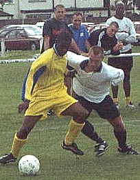 Danny Clarke tussles for the ball at Leyton Pennant